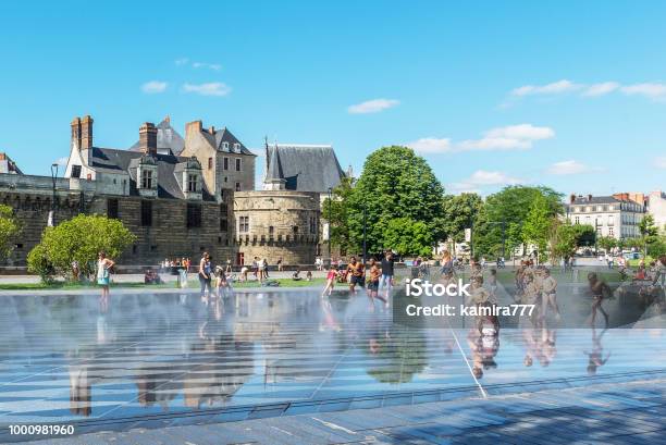 Children Play In The Fountain In Front Of The Fortress In Nantes France Stock Photo - Download Image Now