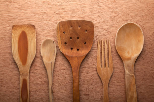 istock wooden kitchen utensils on wood 1000997282