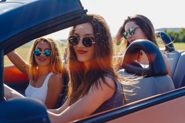 istock Young women on a road trip with cabriolet 1001001562