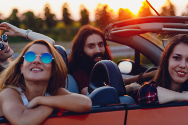 istock Young women on a road trip with cabriolet 1001007324