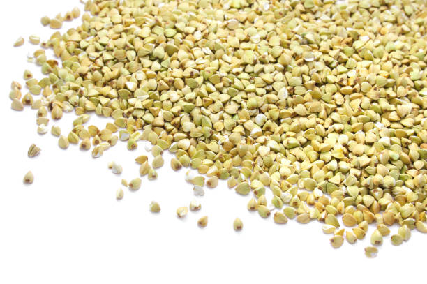 istock Green buckwheat groat isolated on white 1001016884
