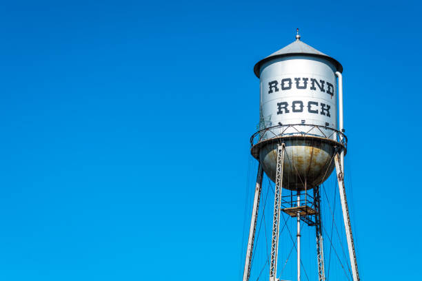 istock Round Rock Blue Sky with Historic Water Tower 1001017606