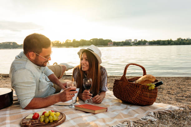 istock Young couple relaxing at the beach 1001030782