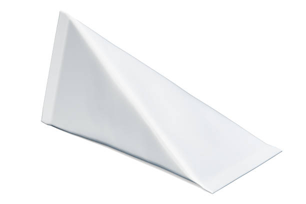 istock White mock up cardboard triangle box packing on the wooden table, 3D rendering 1001044920