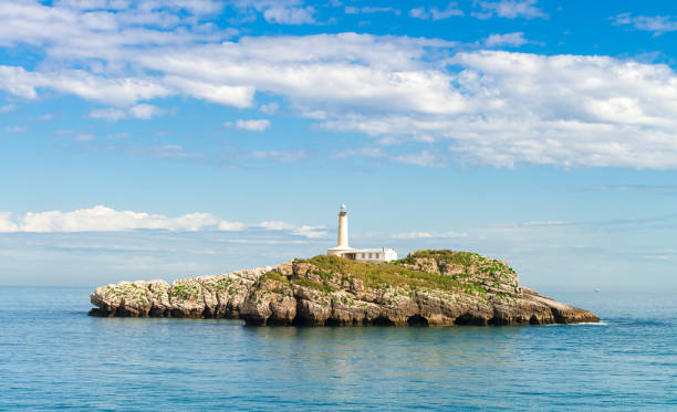 маяк в сантандере - storm lighthouse cloudscape sea стоковые фото и изображения