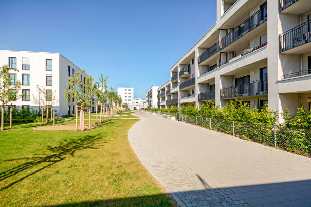 New modern apartment buildings in a residential complex in the city New modern apartment buildings in a residential complex in the city brics photos stock pictures, royalty-free photos & images