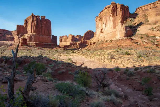The iconic red slickrock strata found looking up the trail along the Park Avenue Trail in Arches National Park