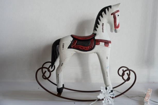 istock Toy rocking horse isolated on white 1001121680