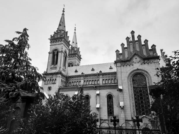 istock old catholic cathedral church in gothic style. black and white 1001130468