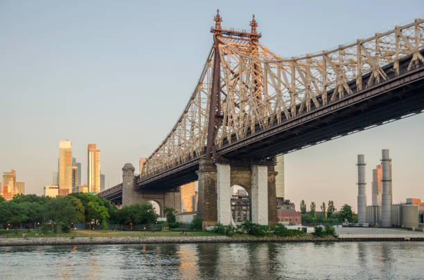 istock Ed Koch bridge in New York City at sunset 1001134106
