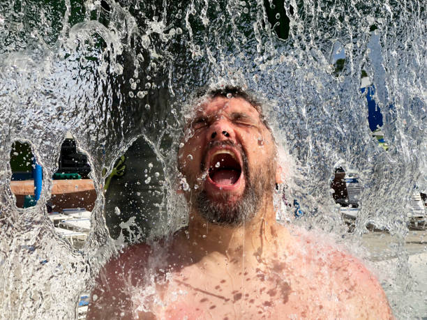 istock Man in Splash of Water 1001139736