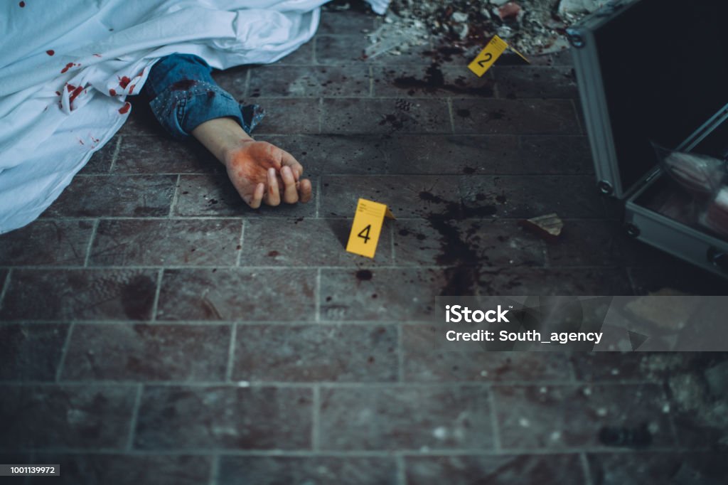 Crime scene Detectives and forensics on murder crime scene collecting evidence Murder Stock Photo