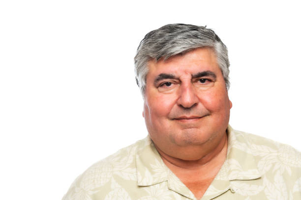 istock mature/senior man looking at the camera on white background 1001148508