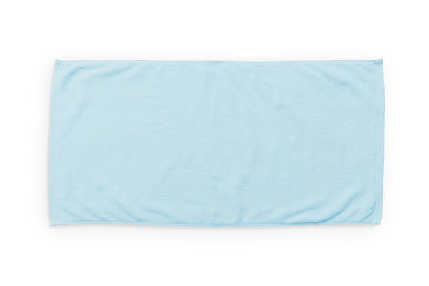 istock Light blue beach towel mock up isolated on white background, flat lay top view 1001165098