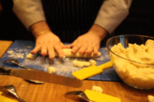 istock Blurred of Professional Italian Starred Chef making and cutting pasta in a kitchen. 1001168280