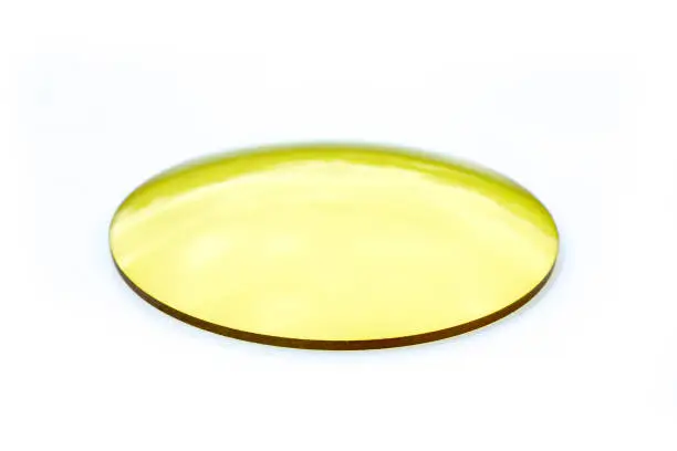 Image of resin glass for spectacles on white background. Glass Lenses.