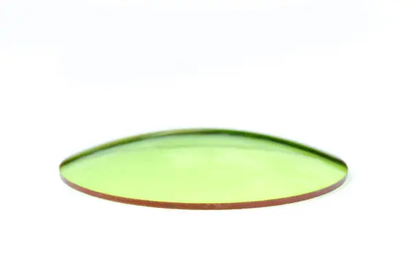 Image of resin glass for spectacles on white background. Glass Lenses.