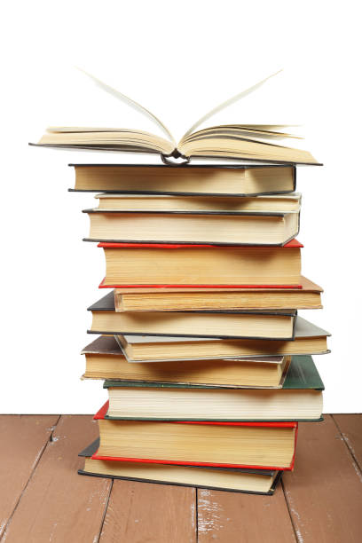 istock Science and education - group red books open top on the wooden table 1001181966