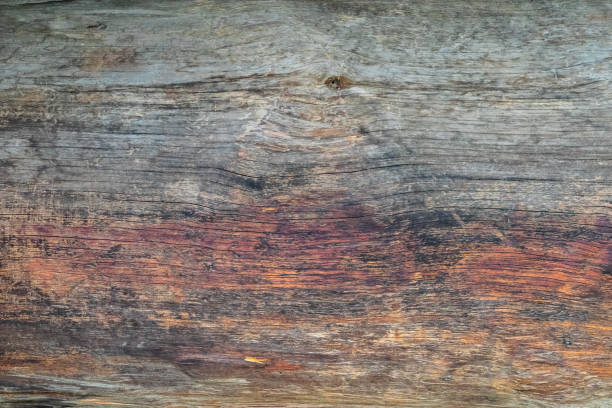 istock Old wooden board, background texture red yellow 1001187782