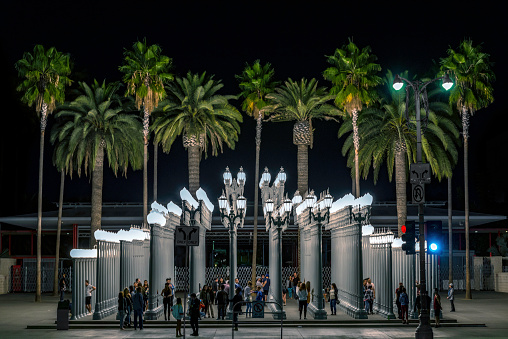 Urban Light is a large-scale assemblage sculpture by Chris Burden located at the Wilshire Boulevard entrance to the Los Angeles County Museum of Art. The 2008 installation consists of restored street lamps from the 1920s and 1930s.