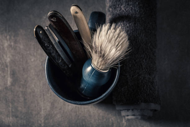 istock Vintage barber equipment with foam, razor and brush 1001193146