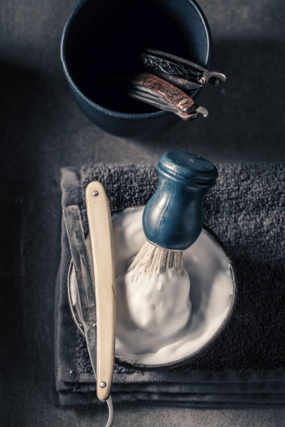 istock Vintage tools for barber with foam, razor and brush 1001193592