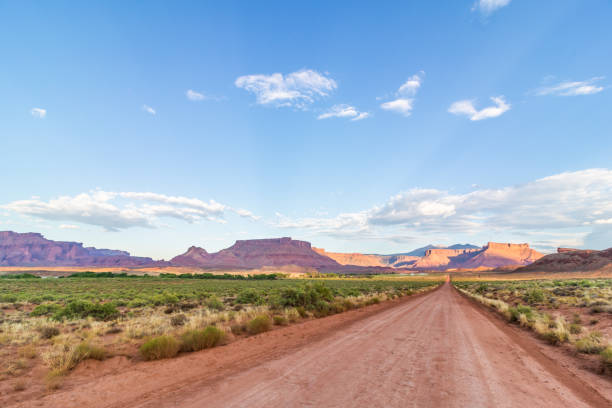 istock Dirt road through Utah desert 1001248686