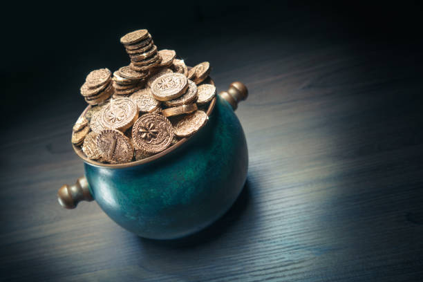 istock Green pot of gold in a dark background 1001255652