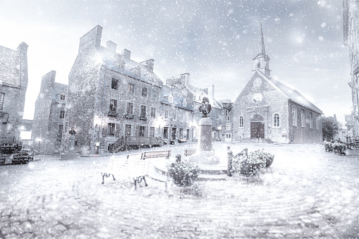 Snow falling on Place Royale - Old Quebec City.