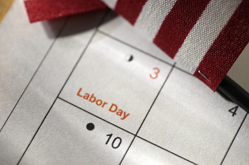shot of word labor day on calendar
