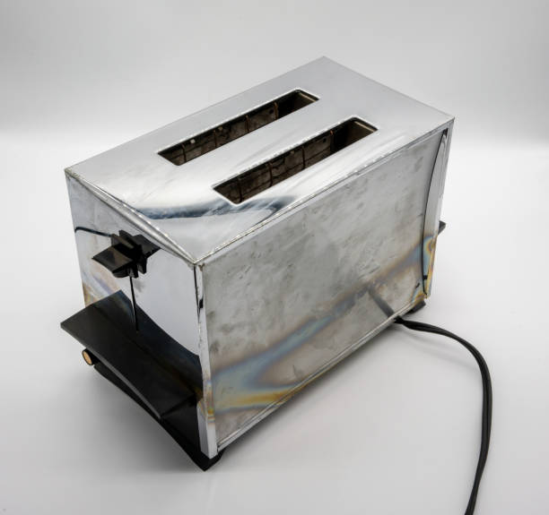 istock Classic vintage chrome toaster isolated on white background 1001273618