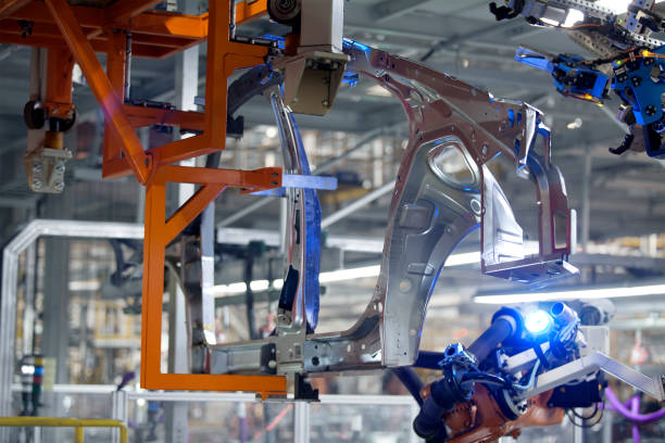 istock Automated assembly line automotive welding laser arm is working 1001282188