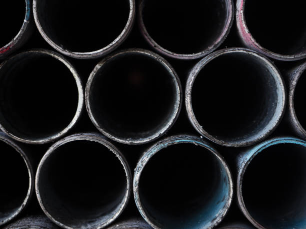 istock Closeup steel pipe stacked in row,abstract art design, 1001302332