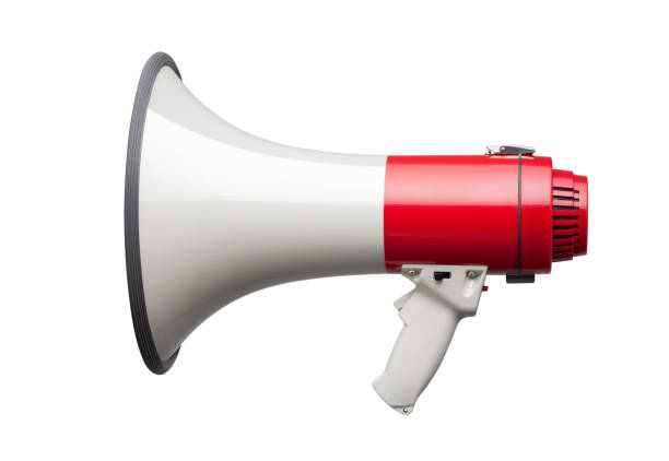 megaphone on white background - isolated on red fotos imagens e fotografias de stock