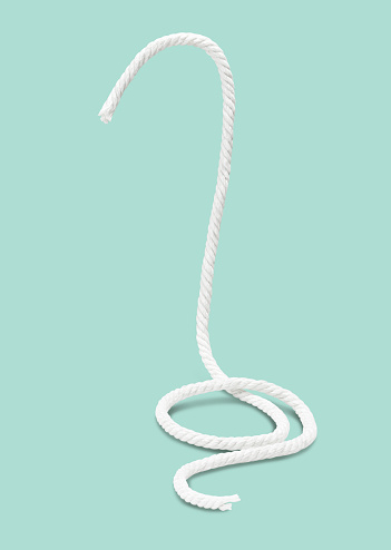 Floating white rope isolated on green background