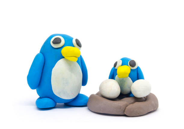 istock Play dough Penguin father and son on white background 1001316380