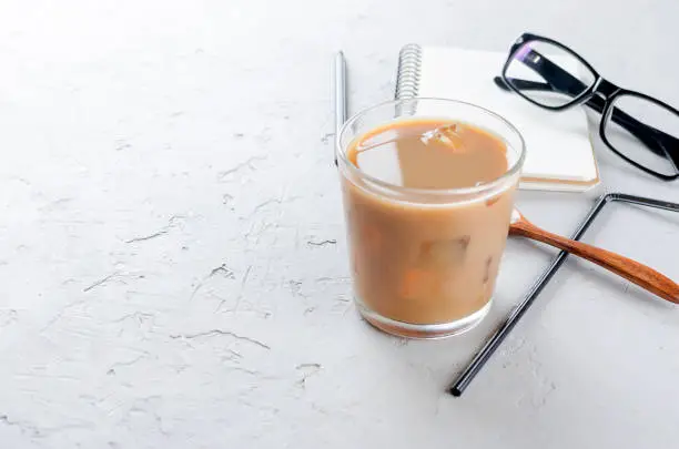 Photo of Iced coffee in glass with ice