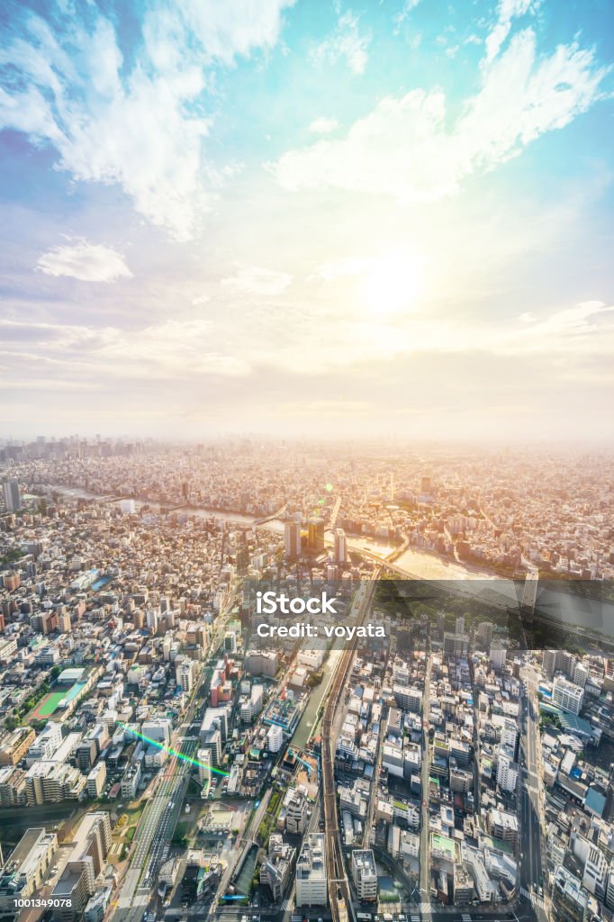 panoramic modern city urban skyline bird eye aerial view under sun & blue sky in Tokyo, Japan Asia Business concept for real estate and corporate construction - panoramic modern city urban skyline bird eye aerial view under sun & blue sky in Tokyo, Japan City Stock Photo