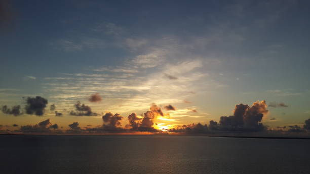 istock Ocean with clouds and sunshine landscape 1001349788