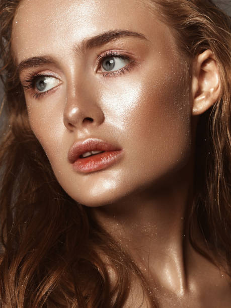 istock Beautiful woman with shiny make-up 1001354892