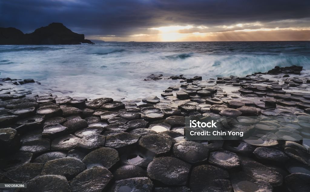 Hexed A storm lets loose at the Giant's Causeway, Ireland. Giants Causeway Stock Photo