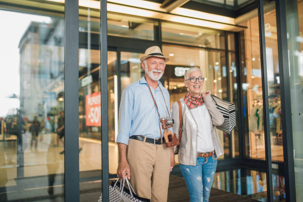 istock Happy couple returning from the shopping mall 1001358596