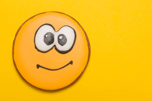 istock cookie smile and emotion, embarrassment, baby gingerbread, on yellow background, concept, copy space 1001363000