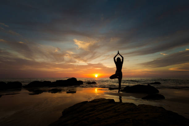istock Thai sunset yoga on Kradan 1001370270