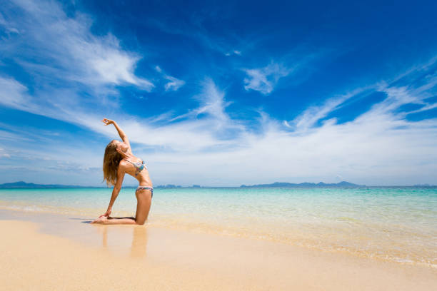 istock Yoga on tropical thai beach 1001373964