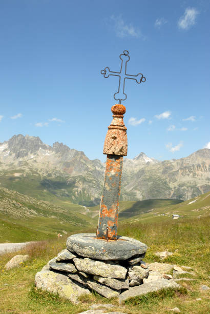 The Iron Cross in the Alps The Iron Cross in the Alps iron cross stock pictures, royalty-free photos & images