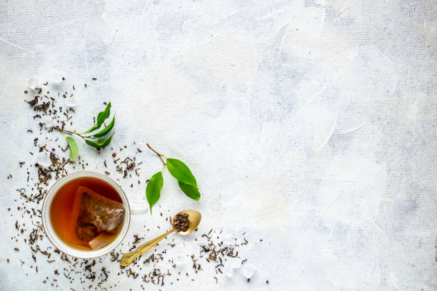 Top view of a cup of tea Top view of a cup of tea with tea bag, space for your text tea crop photos stock pictures, royalty-free photos & images