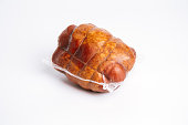 Smoked meat product  in transparent plastic package