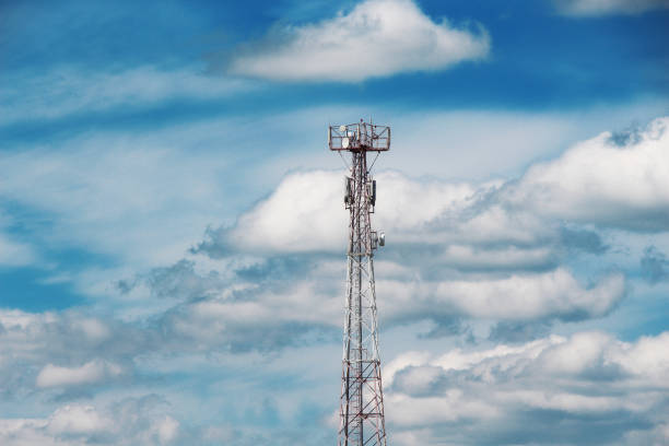 istock GSM station on the background of clouds / 1001393648