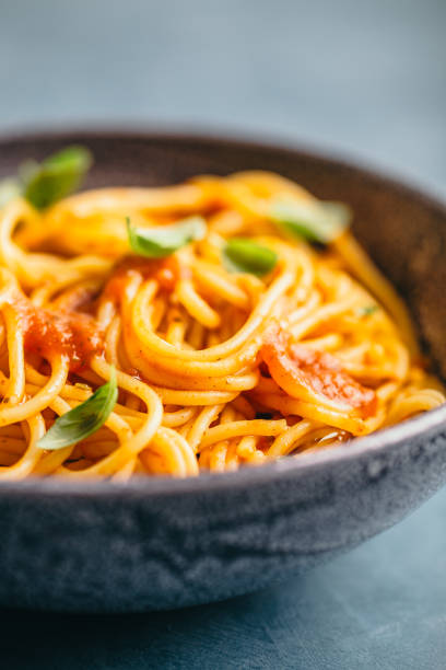 istock Italian pasta with tomato sauce in bowl 1001393666